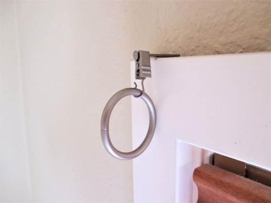 curtains-one-nailed-in